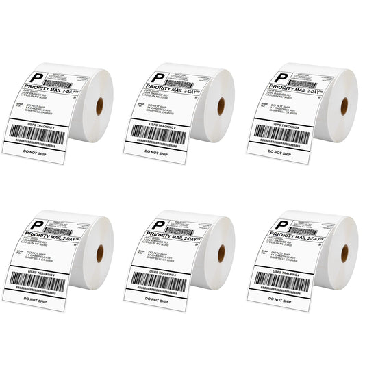 Six rolls of direct thermal waybill labels, each roll with multiple labels arranged in a pattern, predominantly white with printed text and barcode.